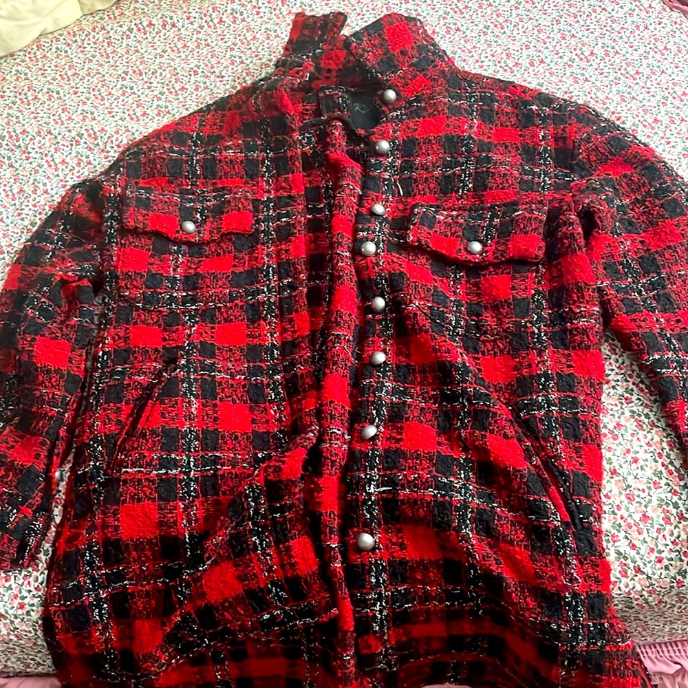 Festive coat with shiny silver buttons and elevated plaid pattern.